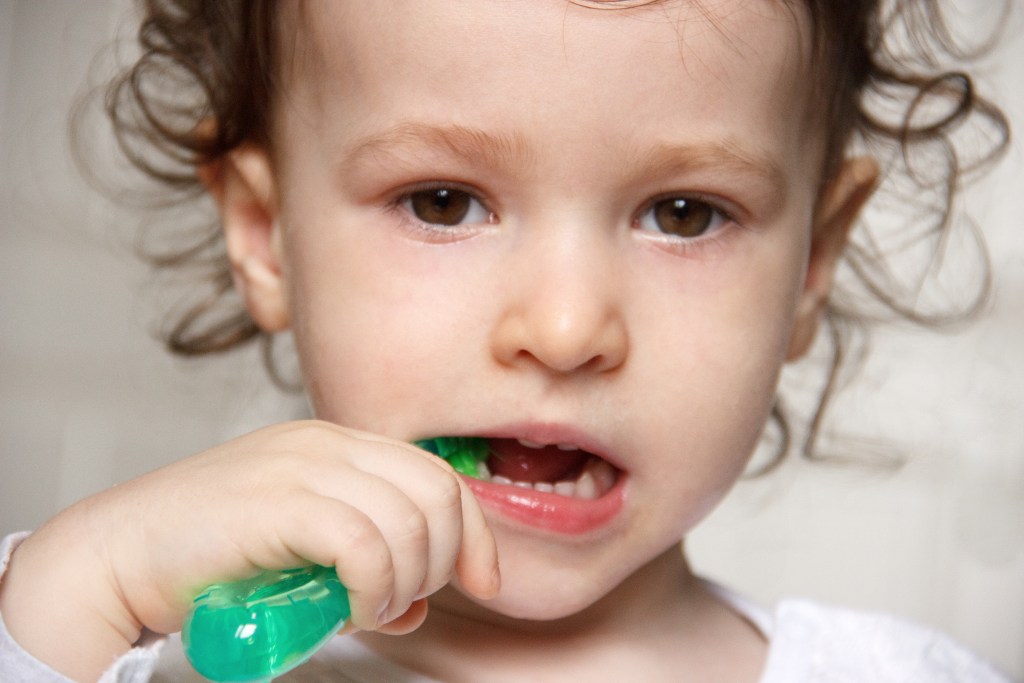 Child Brushing Teeth